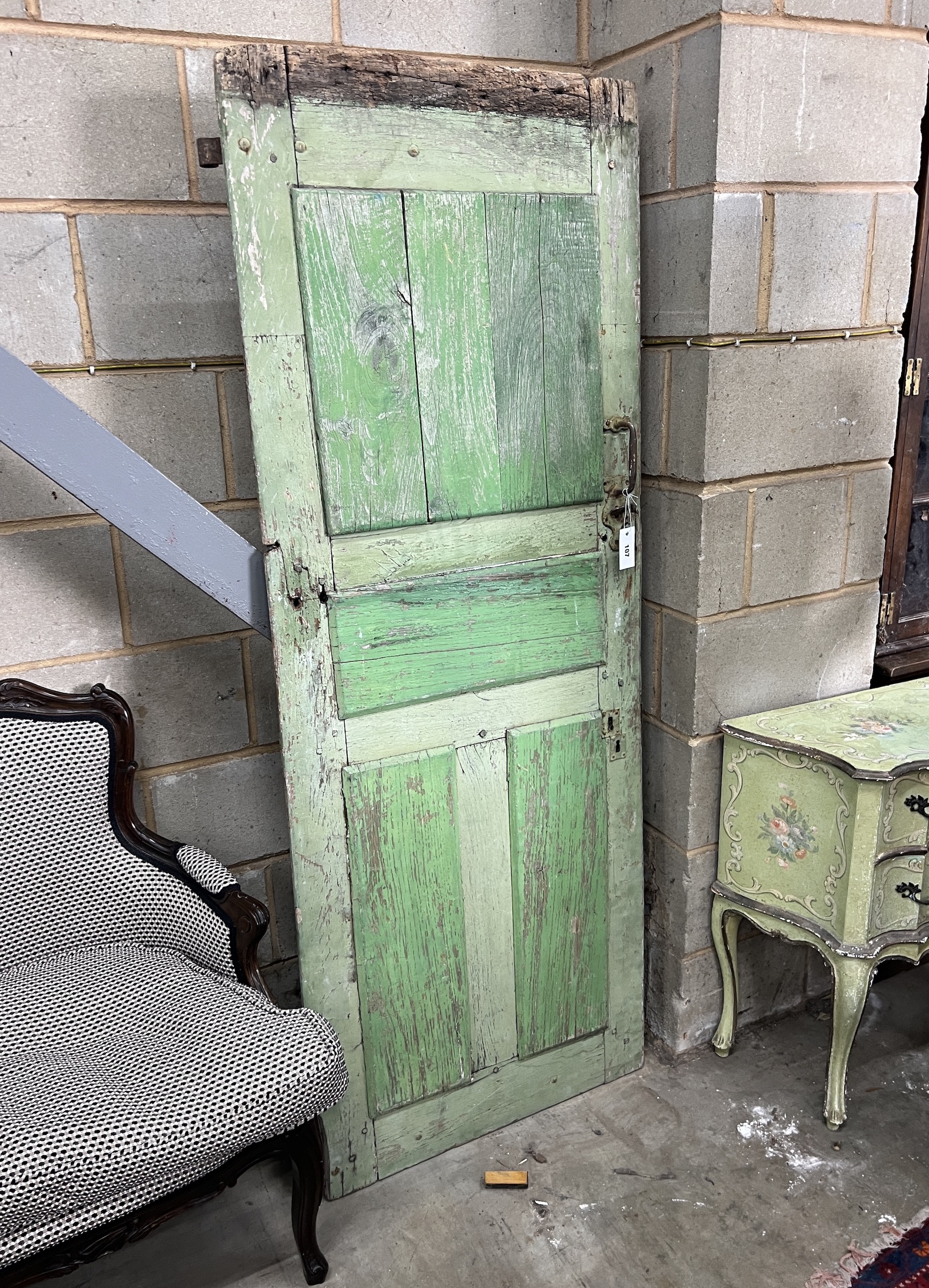 A 19th century painted pine door, width 68cm, height 181cm